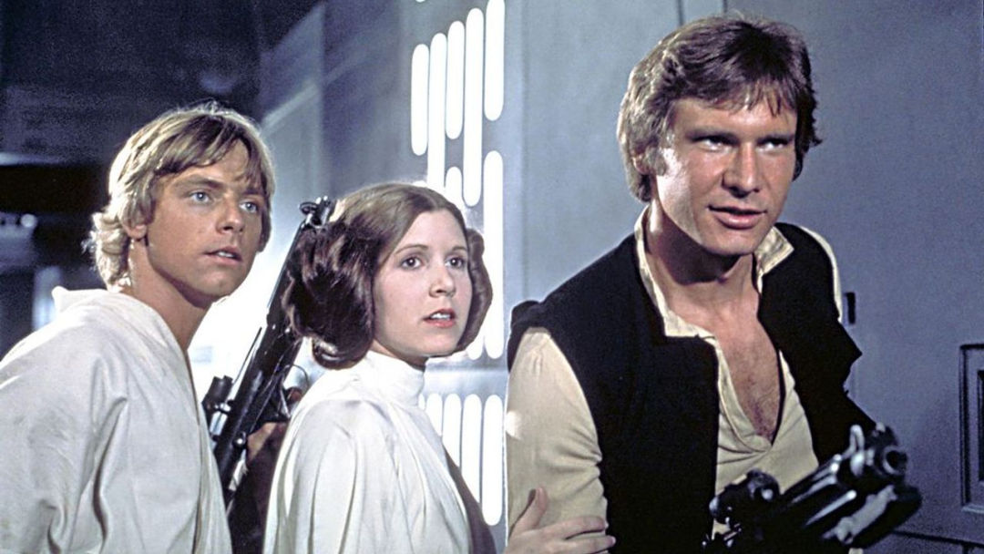 Luke, Leia y Han Solo, con J. J. Abrams